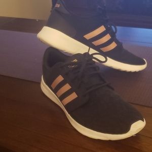 Black and rose gold Addidas sneakers
